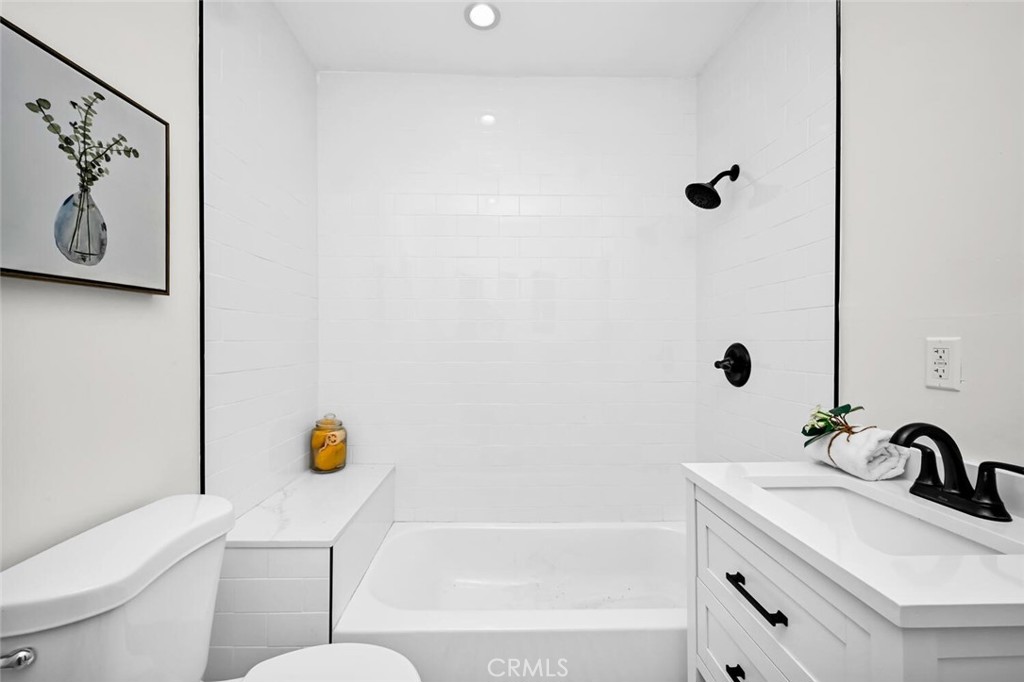 294 Bella Vista Avenue Pasadena, CA 91107 - Photo 27 of 37 a bathroom with a sink and a mirror