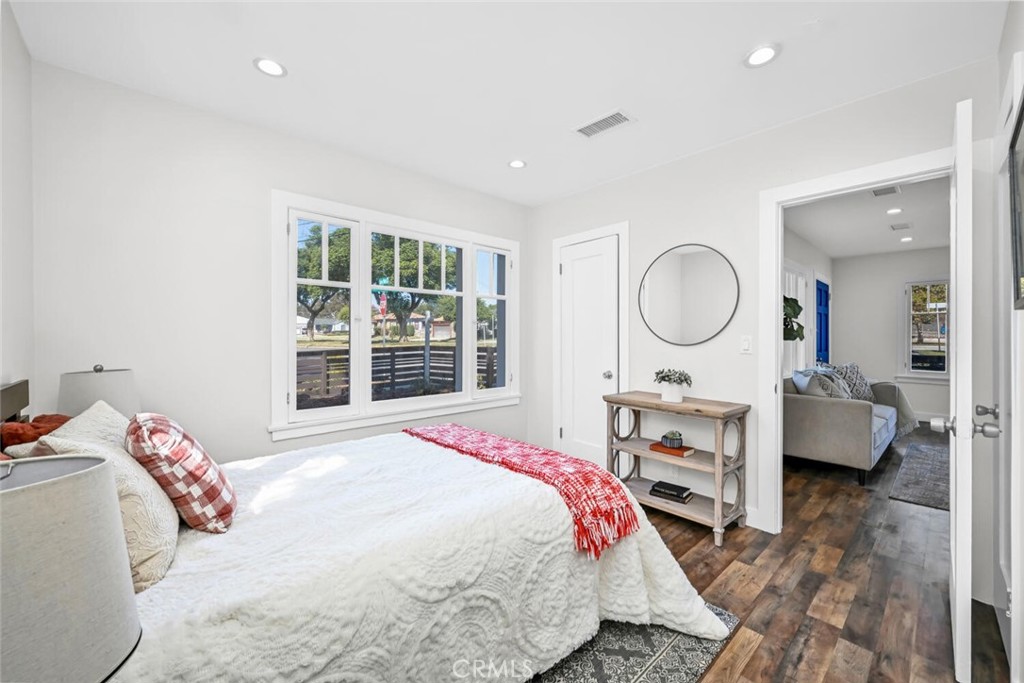 294 Bella Vista Avenue Pasadena, CA 91107 - Photo 28 of 37 a bedroom with a bed a dresser and chair