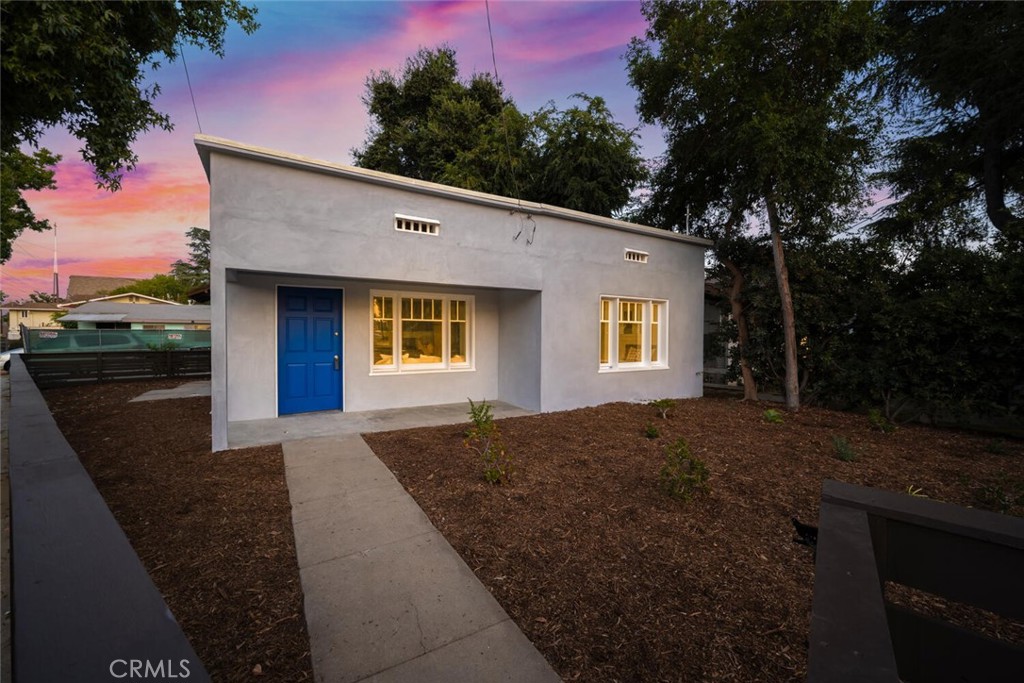 294 Bella Vista Avenue Pasadena, CA 91107 - Photo 3 of 37 a front view of a house with a yard and garage