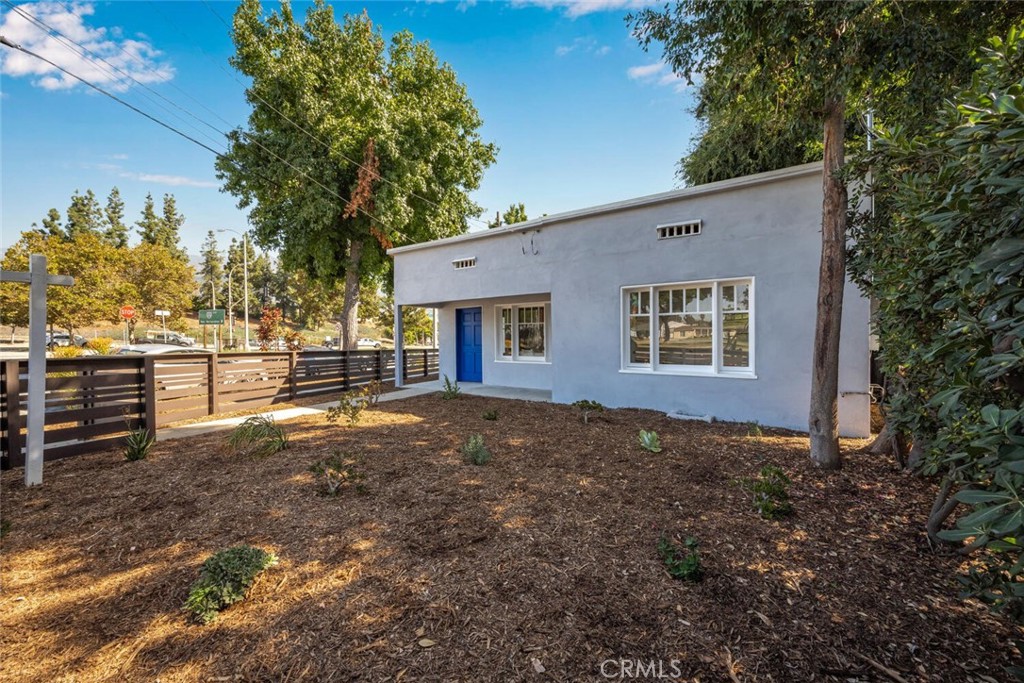 294 Bella Vista Avenue Pasadena, CA 91107 - Photo 32 of 37 a view of a house with backyard and trees