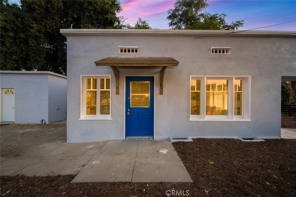 294 Bella Vista Avenue Pasadena, CA 91107 - Photo 8 of 37 a front view of a house with a yard