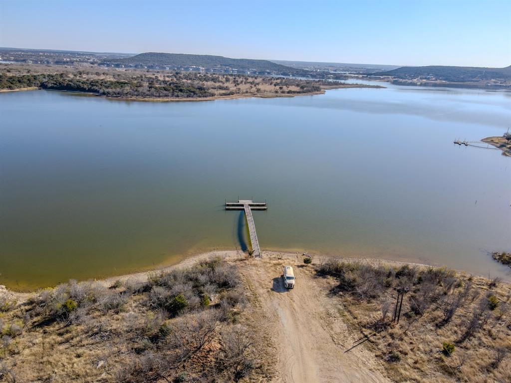 Lot 42 Water Lilly Lane Graham, TX 76450 - Photo 7 of 11 a view of a lake and a mountain