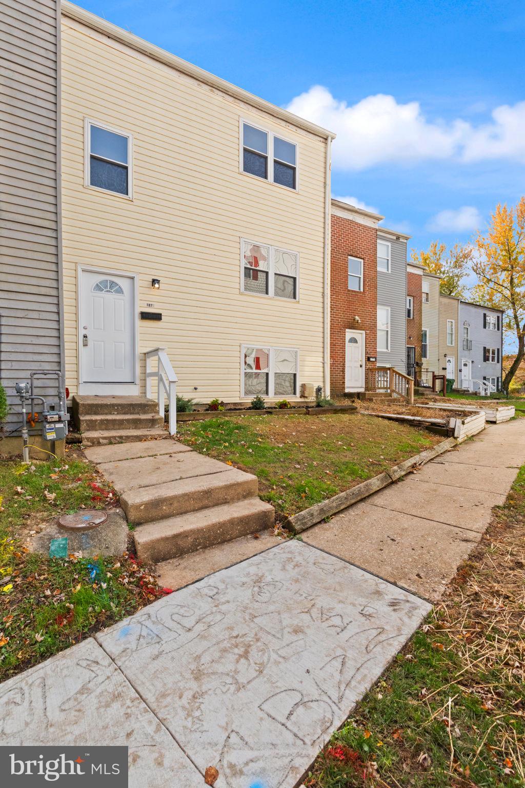 1875 Brookside Drive Edgewood, MD 21040 - Photo 2 of 20 a front view of a building with a yard