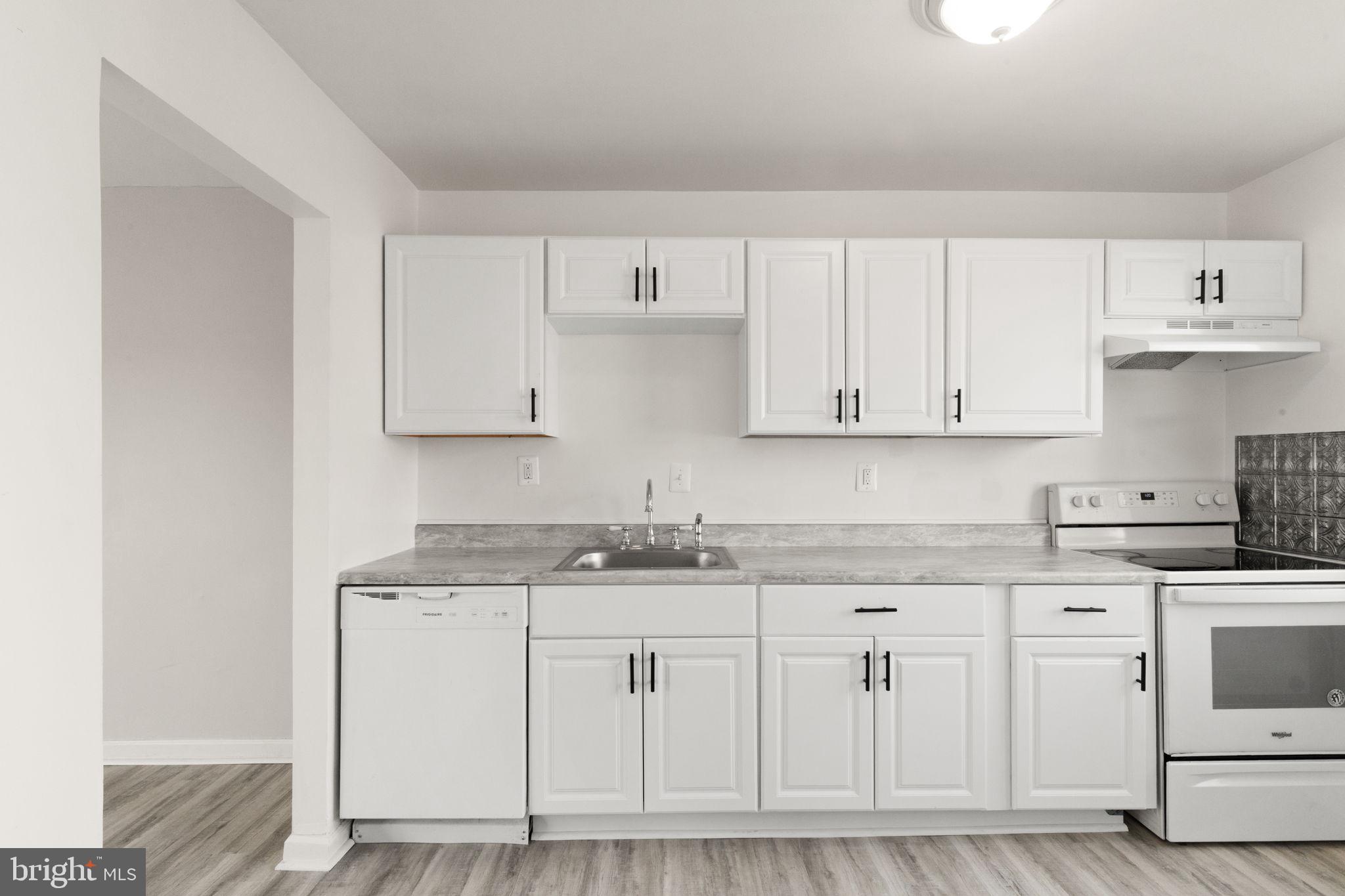 1875 Brookside Drive Edgewood, MD 21040 - Photo 7 of 20 a kitchen with white cabinets