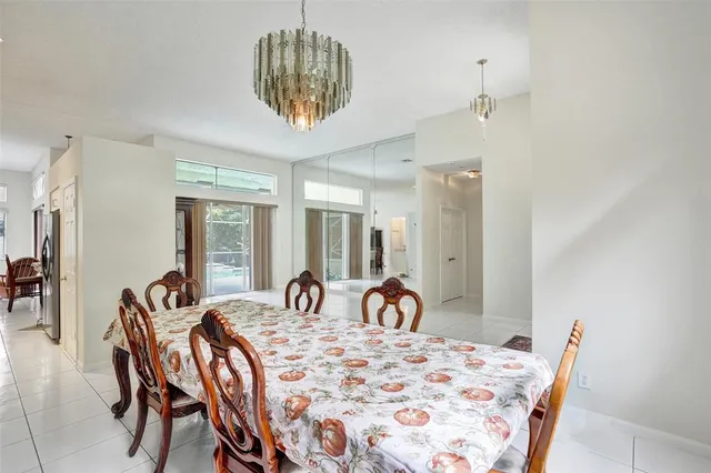 a kitchen with a sink stainless steel appliances and cabinets