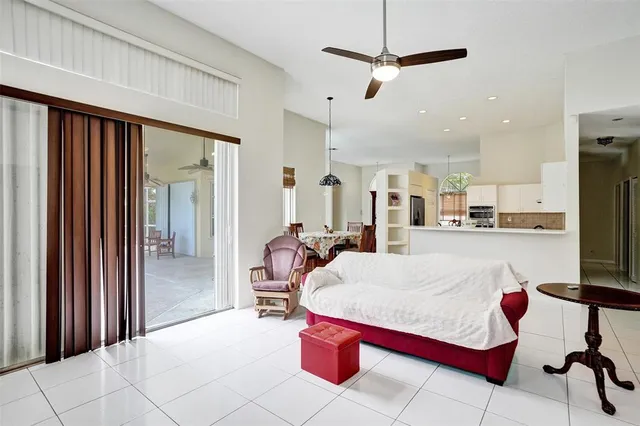 a bedroom with a bed dresser and a window