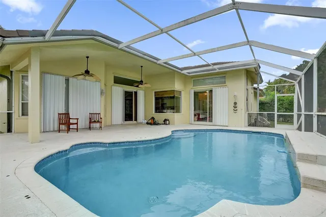 a picture of a bathroom with a shower