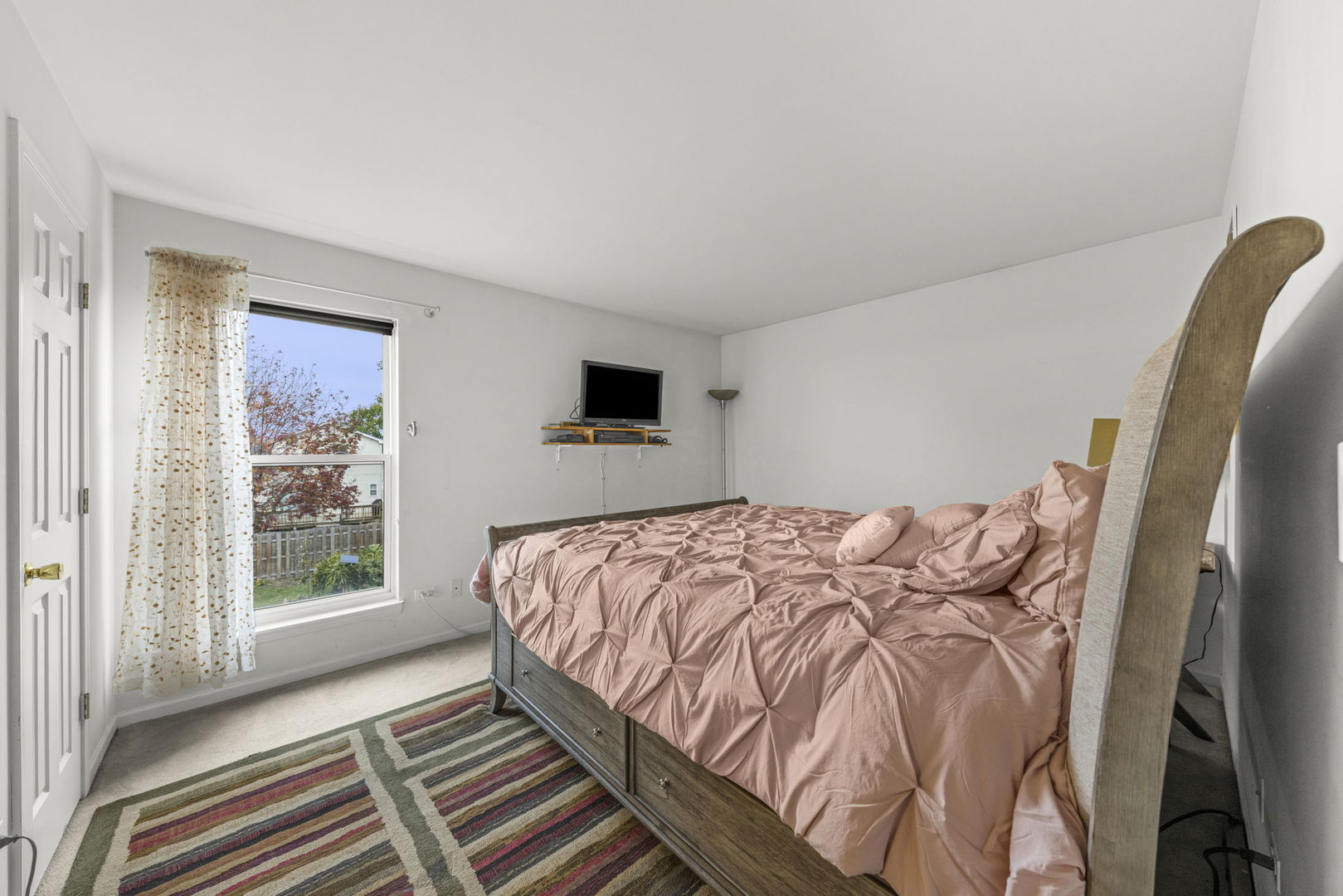 2202 Carpenter Avenue Plainfield, IL 60586 - Photo 17 of 29 a bedroom with a bed and wooden floor