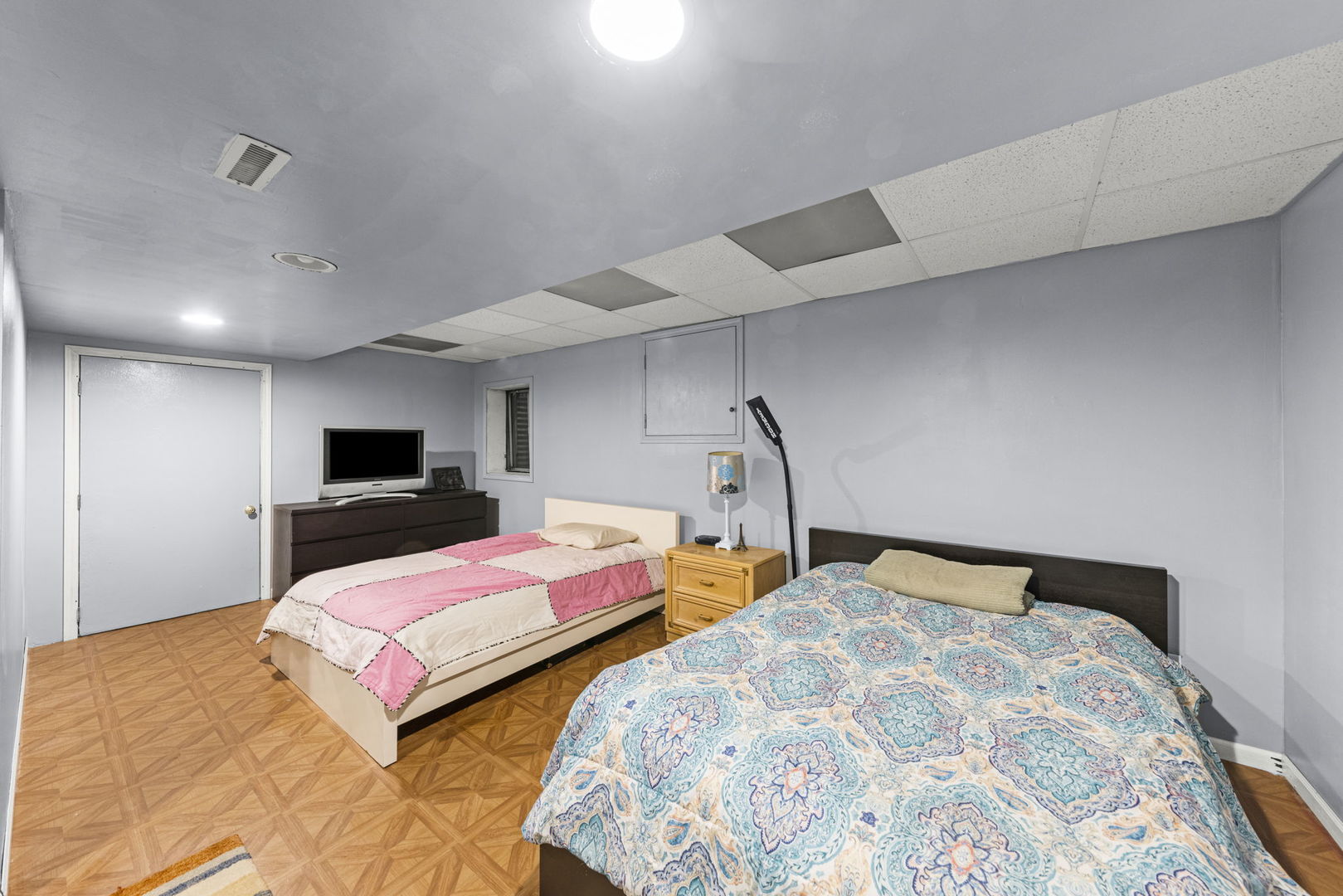 2202 Carpenter Avenue Plainfield, IL 60586 - Photo 23 of 29 a bedroom with two beds and a tv