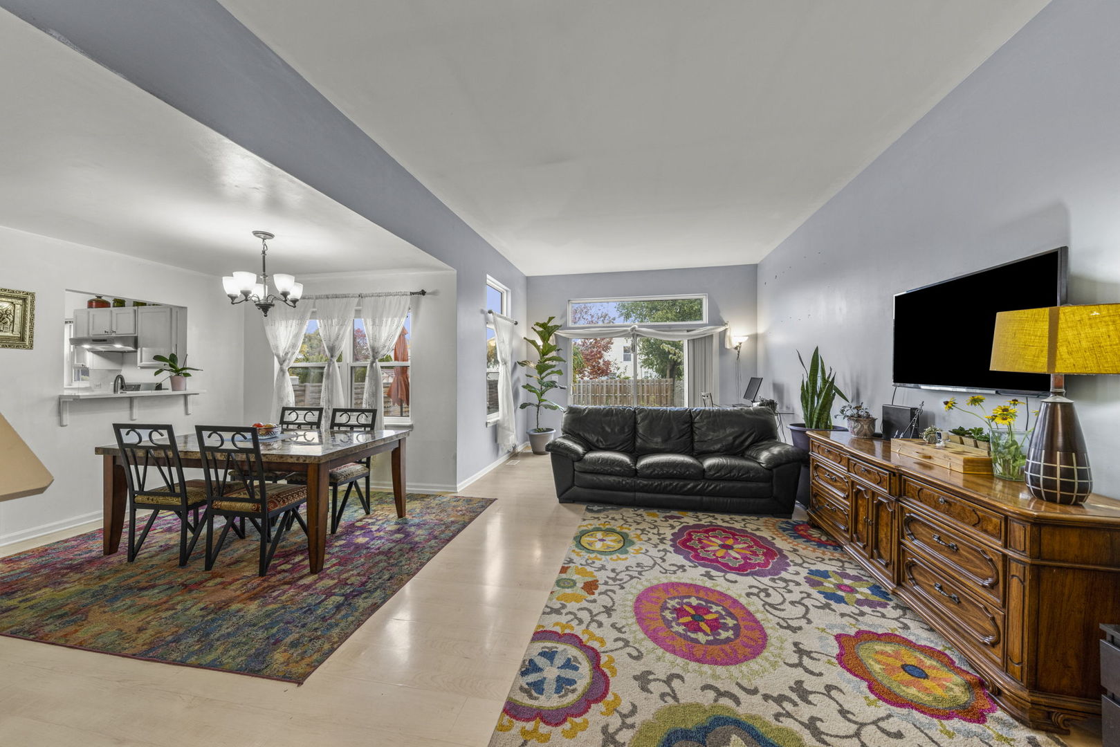 2202 Carpenter Avenue Plainfield, IL 60586 - Photo 4 of 29 a living room with furniture and a flat screen tv