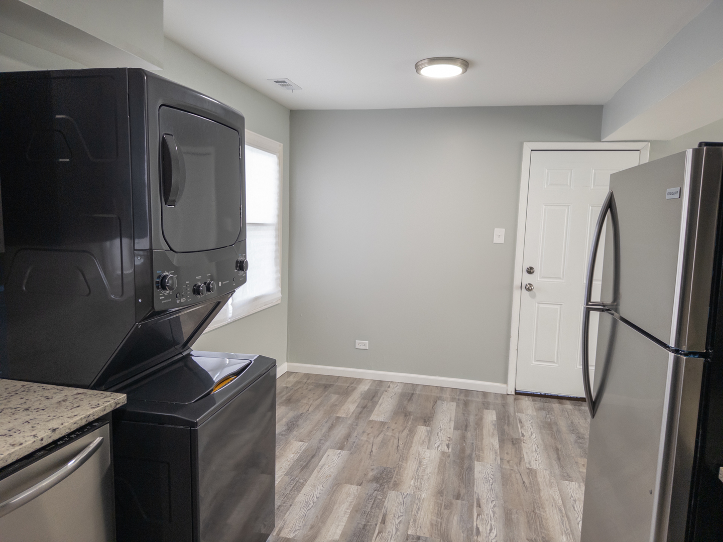 104 Walnut Street Park Forest, IL 60466 - Photo 4 of 20 a kitchen with stainless steel appliances granite countertop a refrigerator a stove and a refrigerator