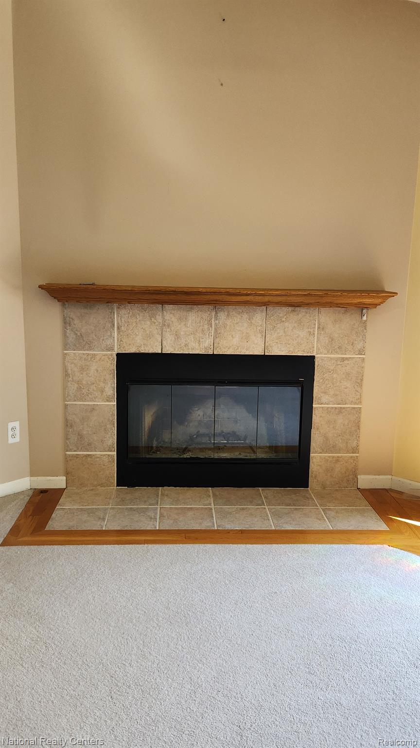 47745 Martz Road Belleville, MI 48111 - Photo 18 of 75 Wood burning fireplace keeps you cozy all winter