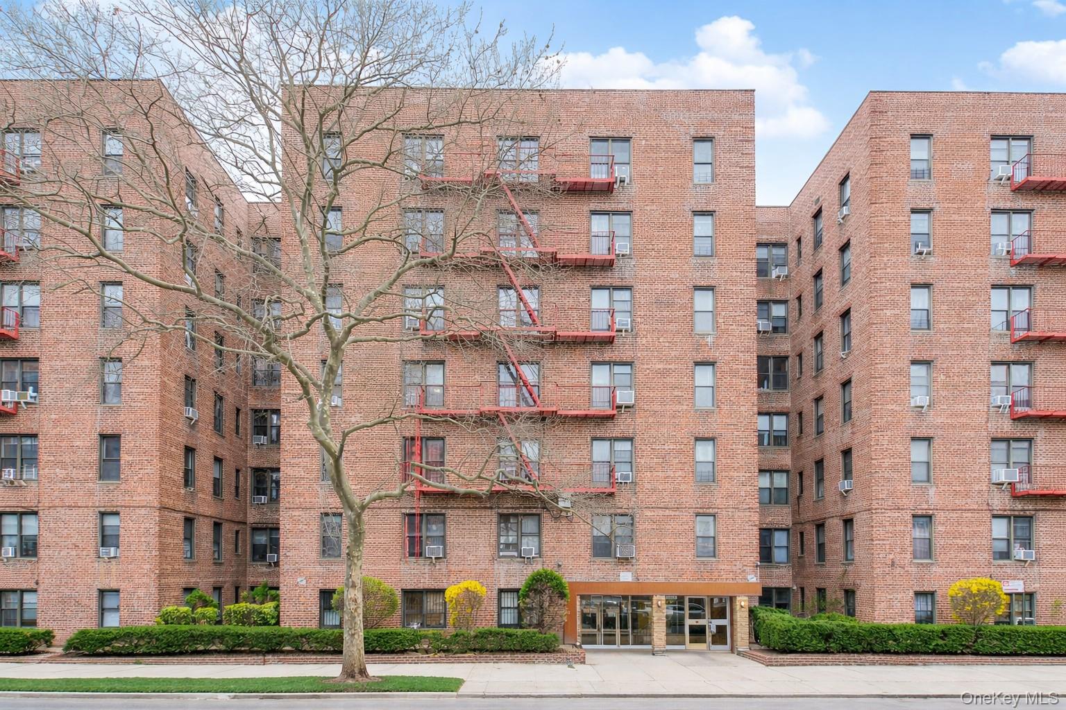 2400 East 3rd Street, Unit 607 Brooklyn, NY 11223 - Photo 3 of 21 a view of a building with a yard