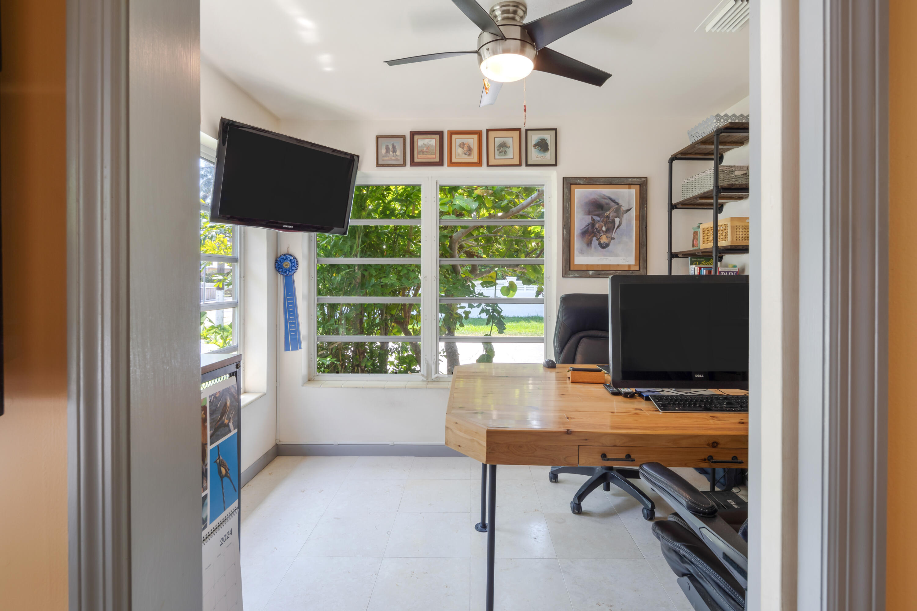 1501 Laird Street Key West, FL 33040 - Photo 11 of 40 a view of workspace with wooden floor and windows