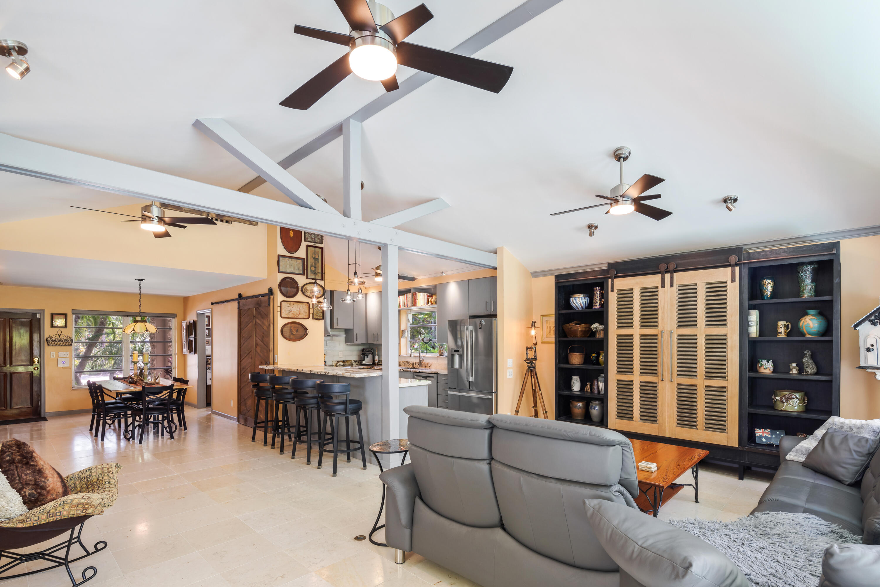 1501 Laird Street Key West, FL 33040 - Photo 16 of 40 a living room with furniture and a large window