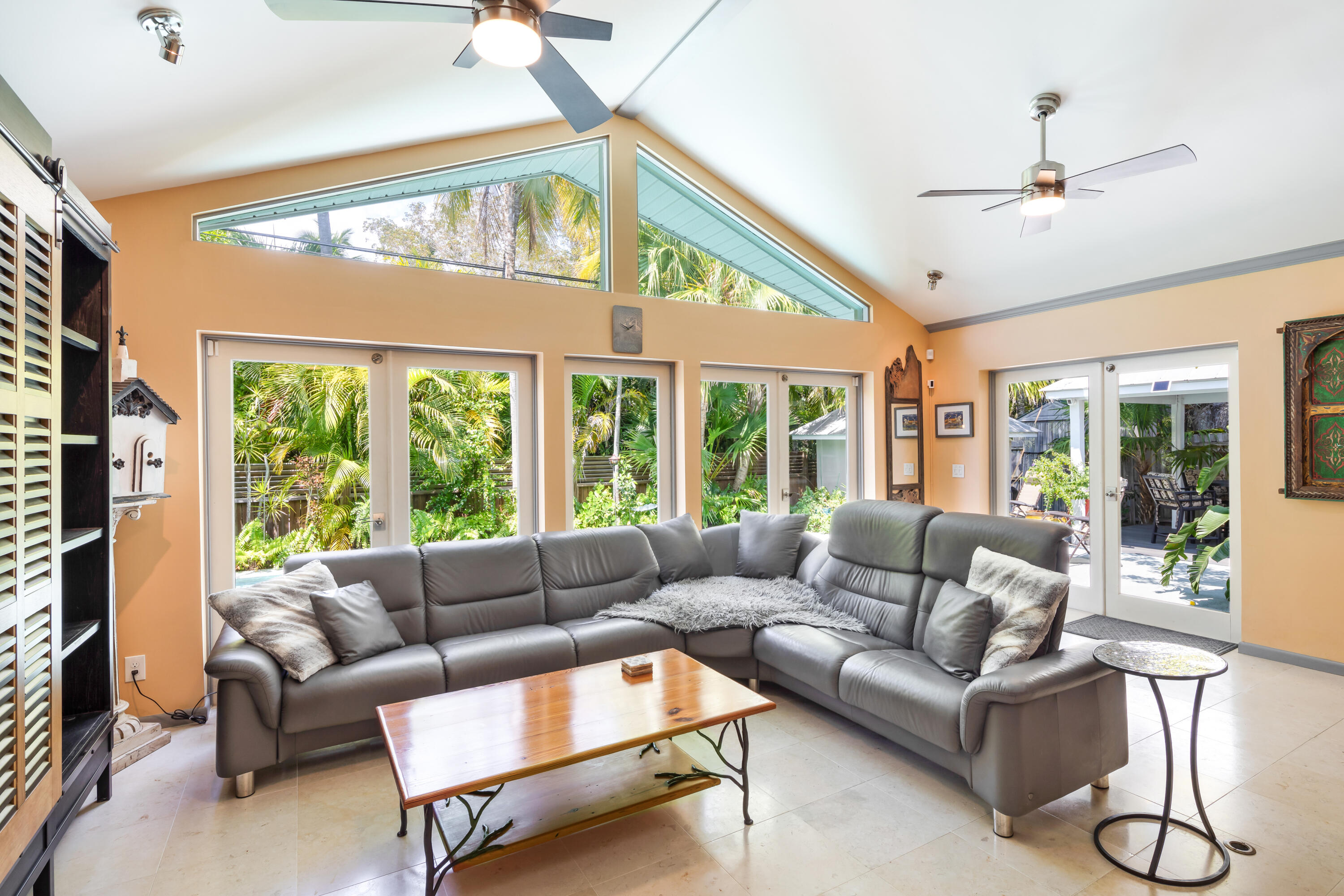 1501 Laird Street Key West, FL 33040 - Photo 17 of 40 a living room with furniture and a large window