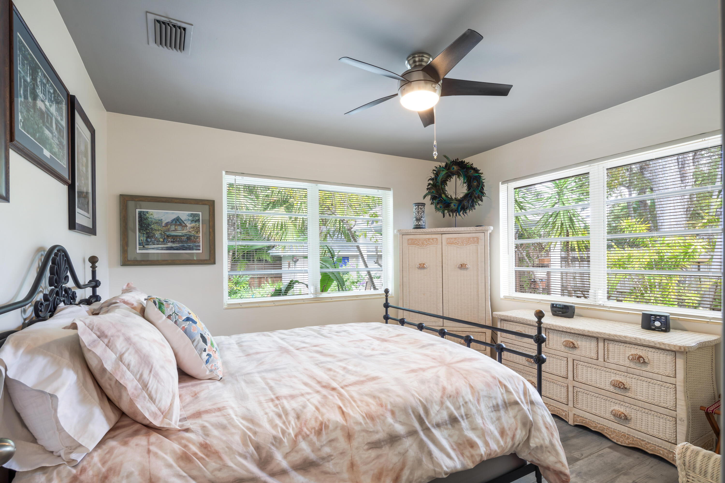 1501 Laird Street Key West, FL 33040 - Photo 20 of 40 a bed sitting in a bedroom next to a window