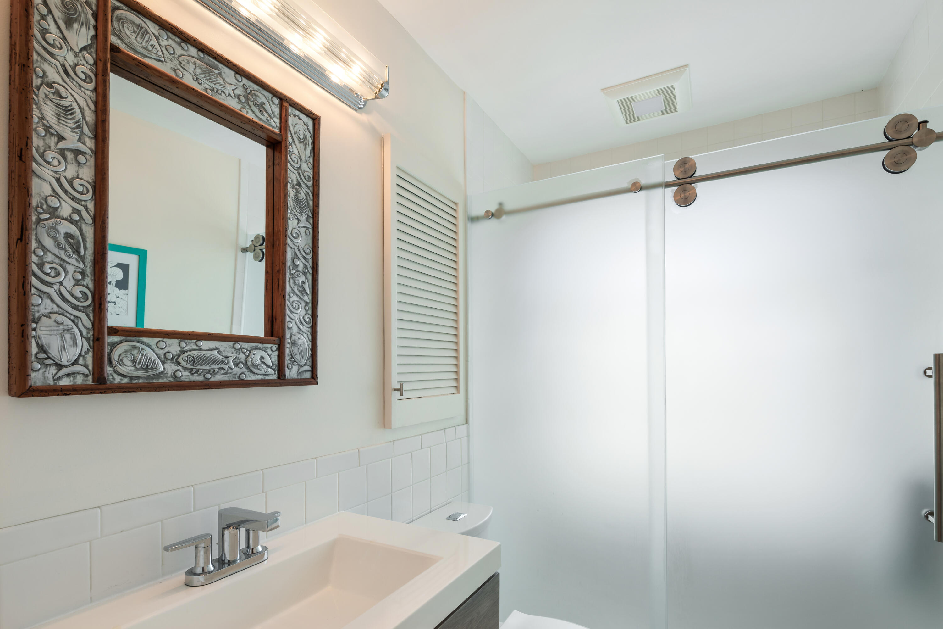 1501 Laird Street Key West, FL 33040 - Photo 22 of 40 a bathroom with a sink and a mirror