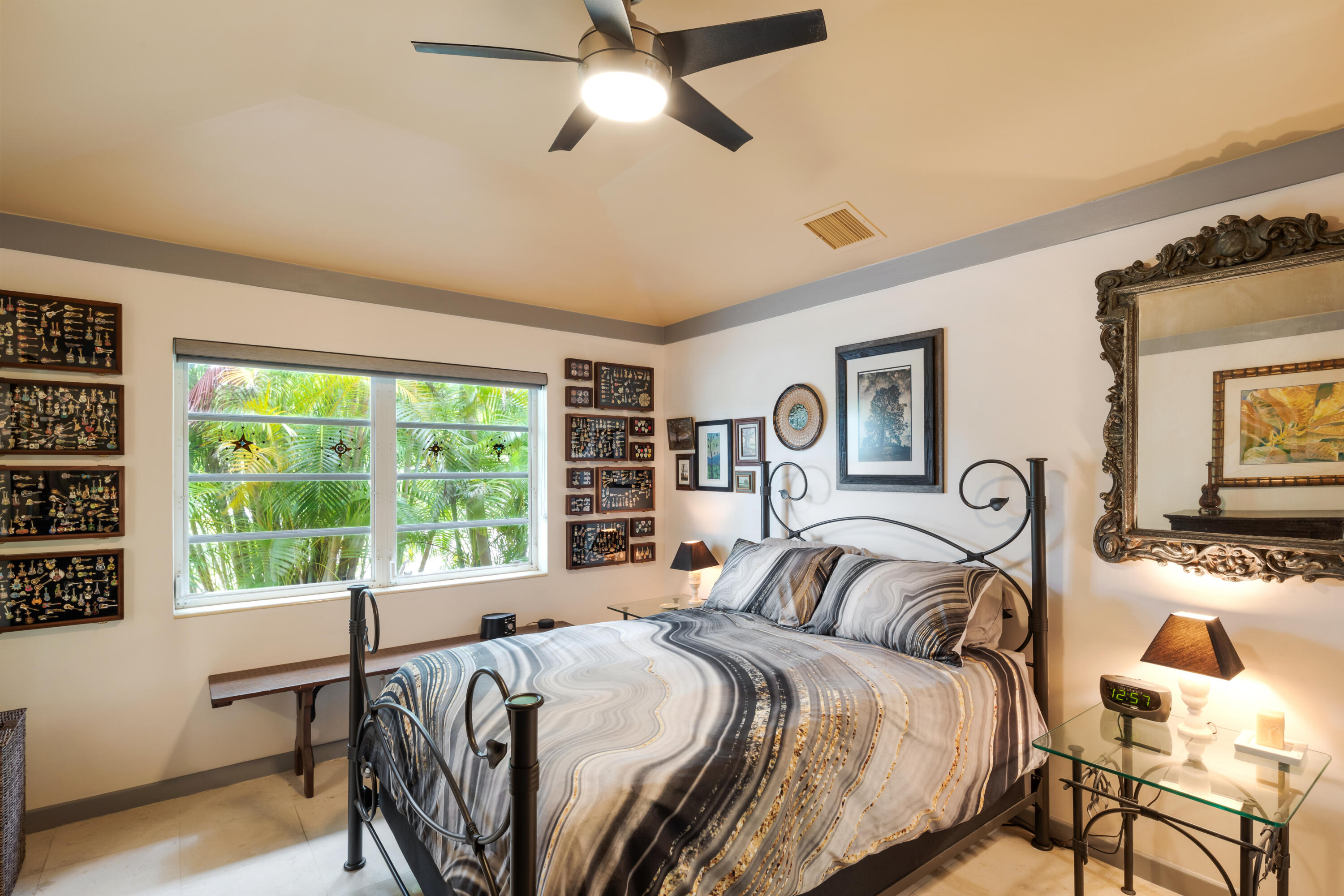 1501 Laird Street Key West, FL 33040 - Photo 24 of 40 a bedroom with a bed and wooden floor