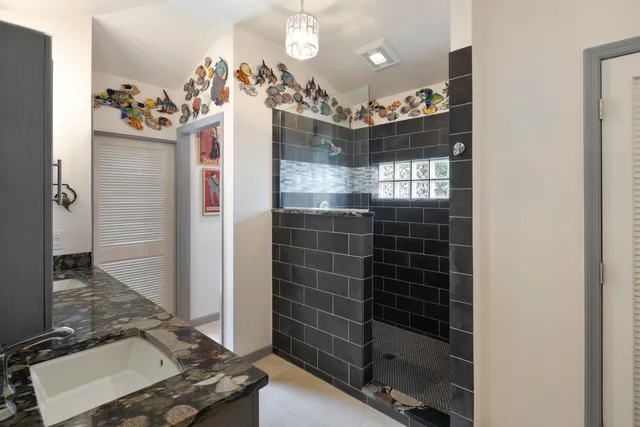a view of a livingroom with furniture and staircase