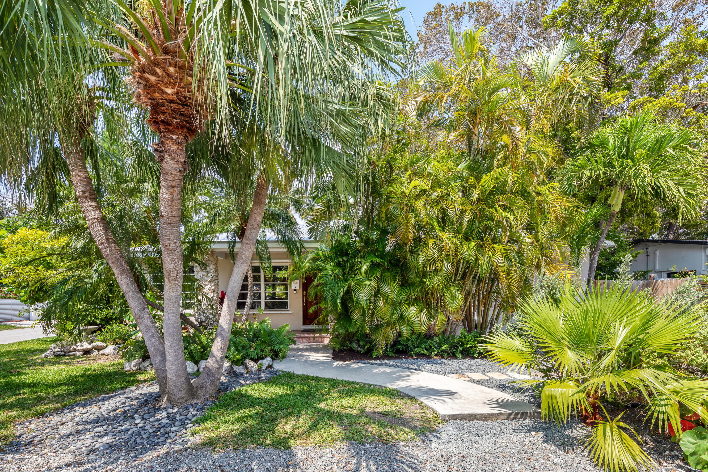 1501 Laird Street Key West, FL 33040 - Photo 3 of 40 a view of a yard with plants and trees