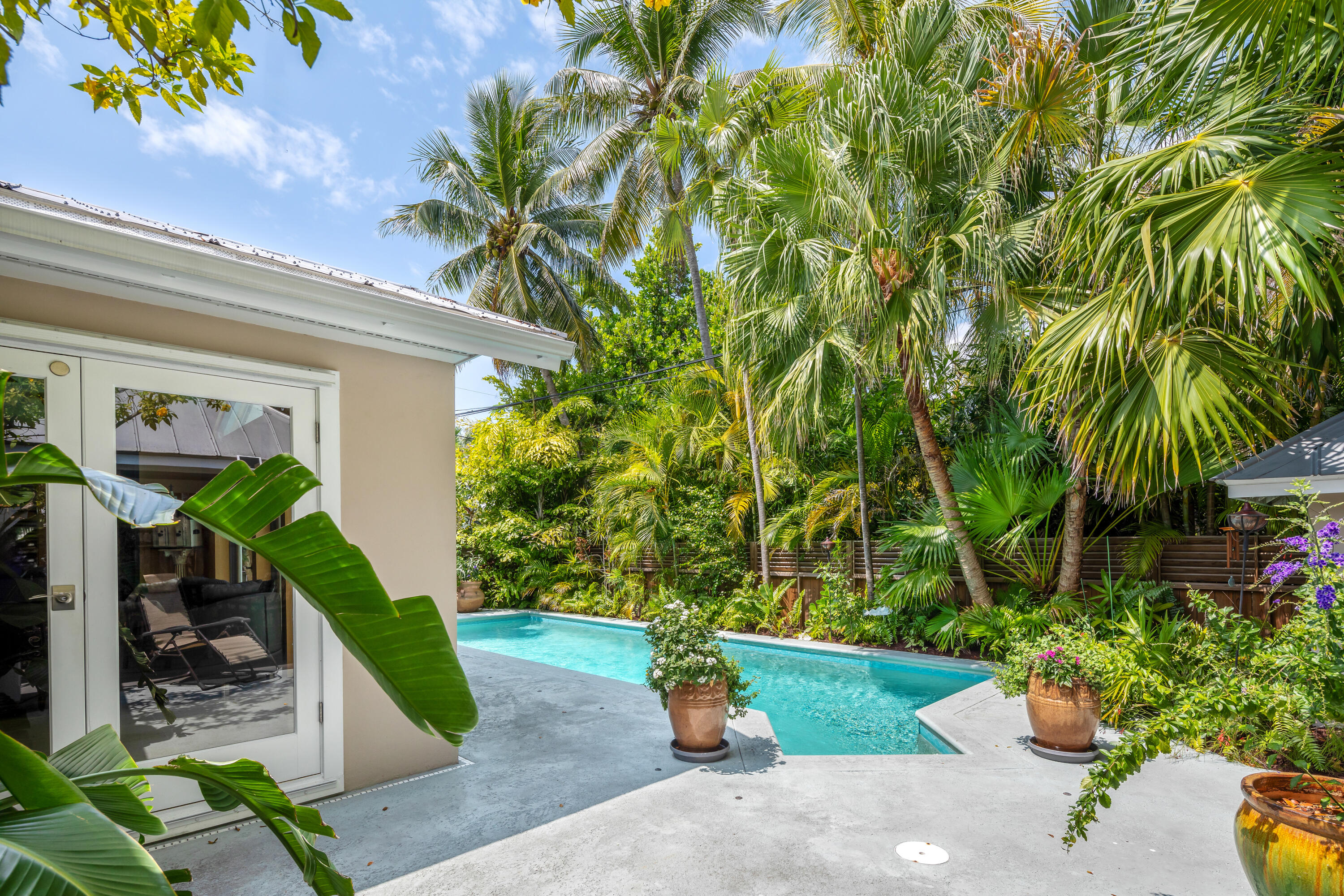 1501 Laird Street Key West, FL 33040 - Photo 34 of 40 a front view of a house with garden