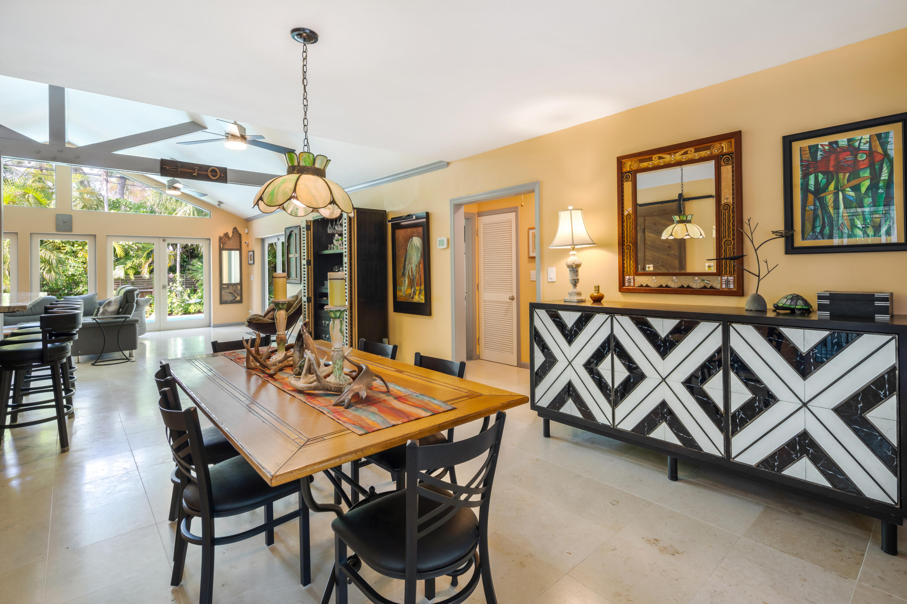 1501 Laird Street Key West, FL 33040 - Photo 8 of 40 a view of a dining room with furniture window and wooden floor