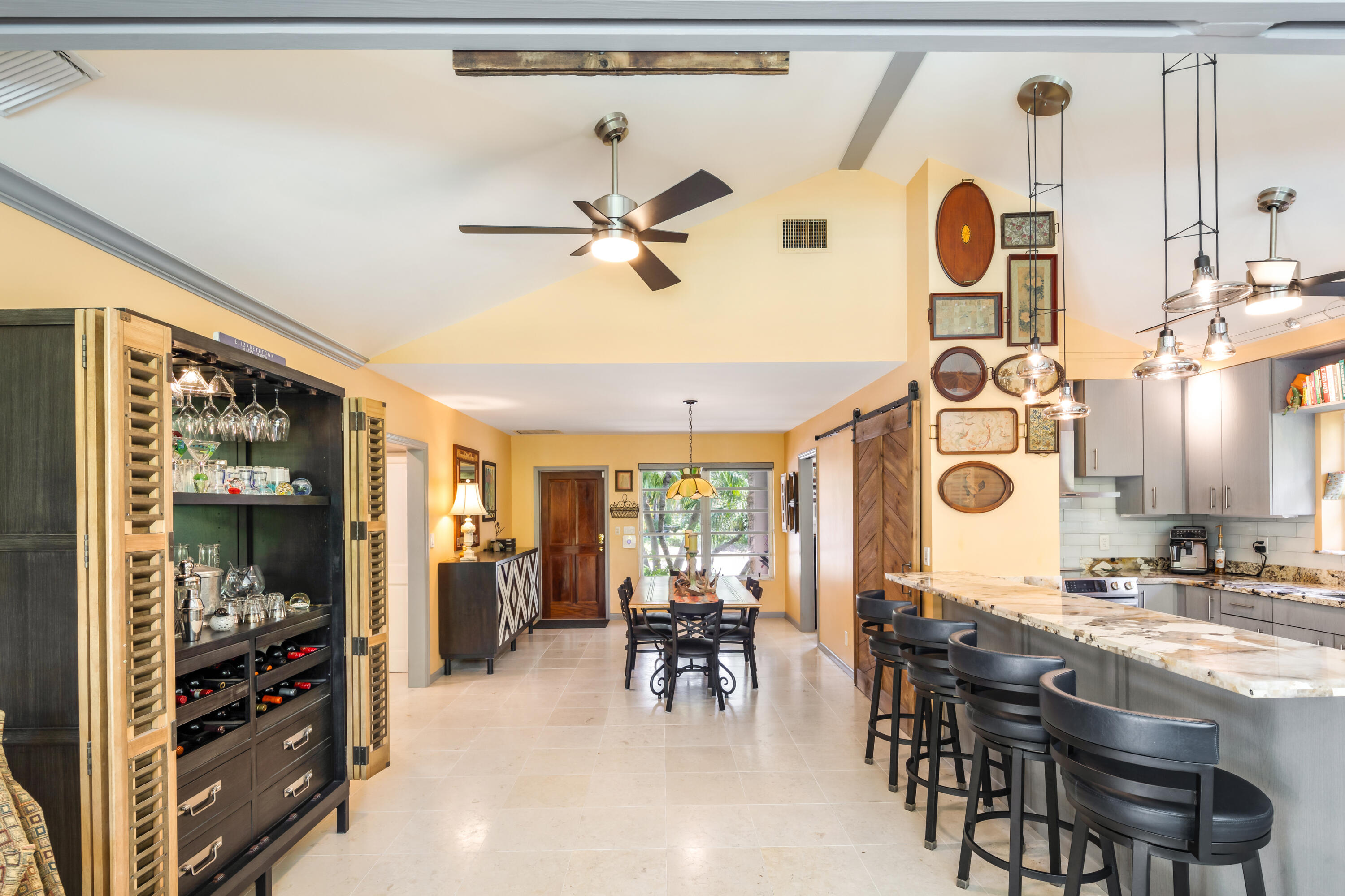 1501 Laird Street Key West, FL 33040 - Photo 9 of 40 a view of a dining room with furniture and chandelier