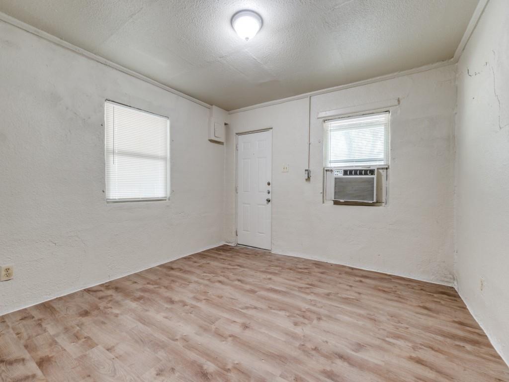 3440 Terrell Street Dallas, TX 75223 - Photo 11 of 11 a view of empty room with wooden floor and fan