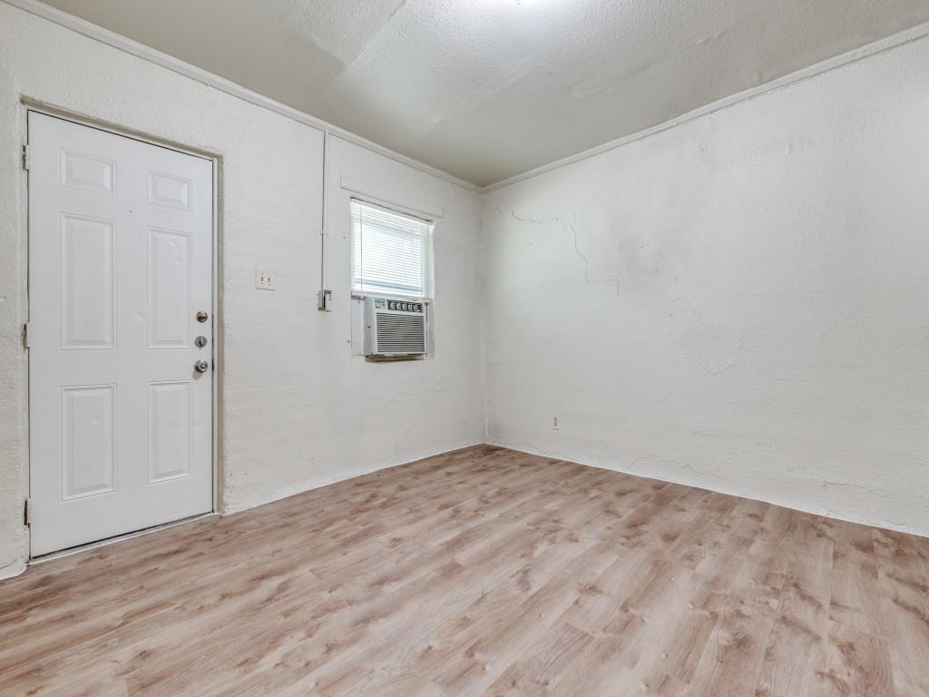 3440 Terrell Street Dallas, TX 75223 - Photo 3 of 11 a view of empty room with wooden floor
