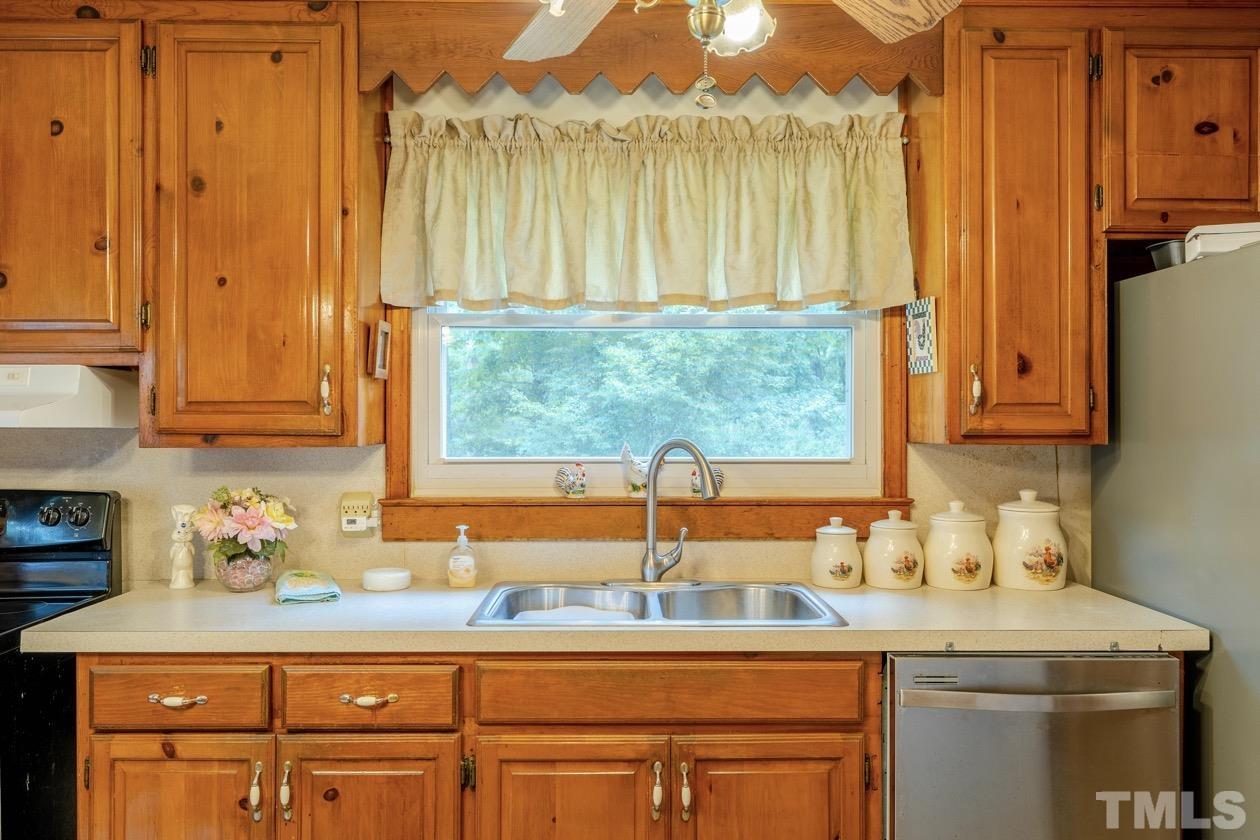 2804 Sparger Road Durham, NC 27705 - Photo 27 of 34 a bathroom with a sink and a window