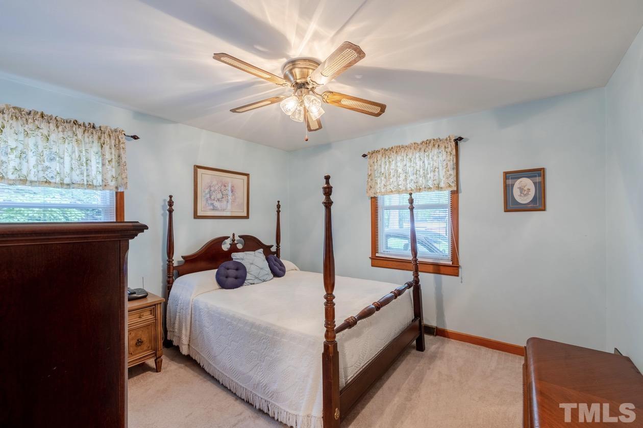 2804 Sparger Road Durham, NC 27705 - Photo 30 of 34 a bedroom with a bed and window