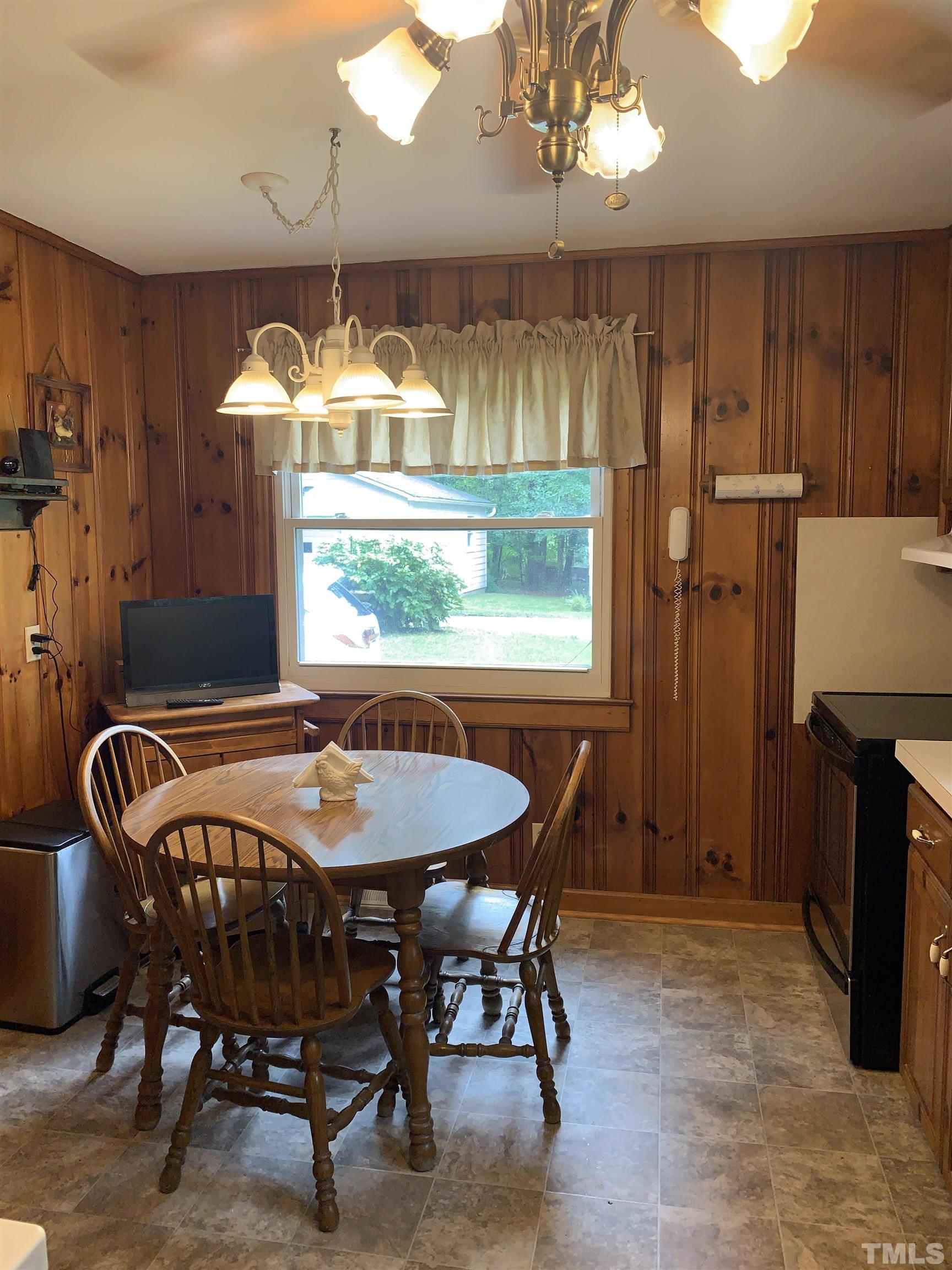 2804 Sparger Road Durham, NC 27705 - Photo 8 of 34 a dining room with furniture and window