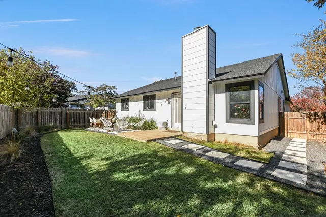 a house view with a garden space