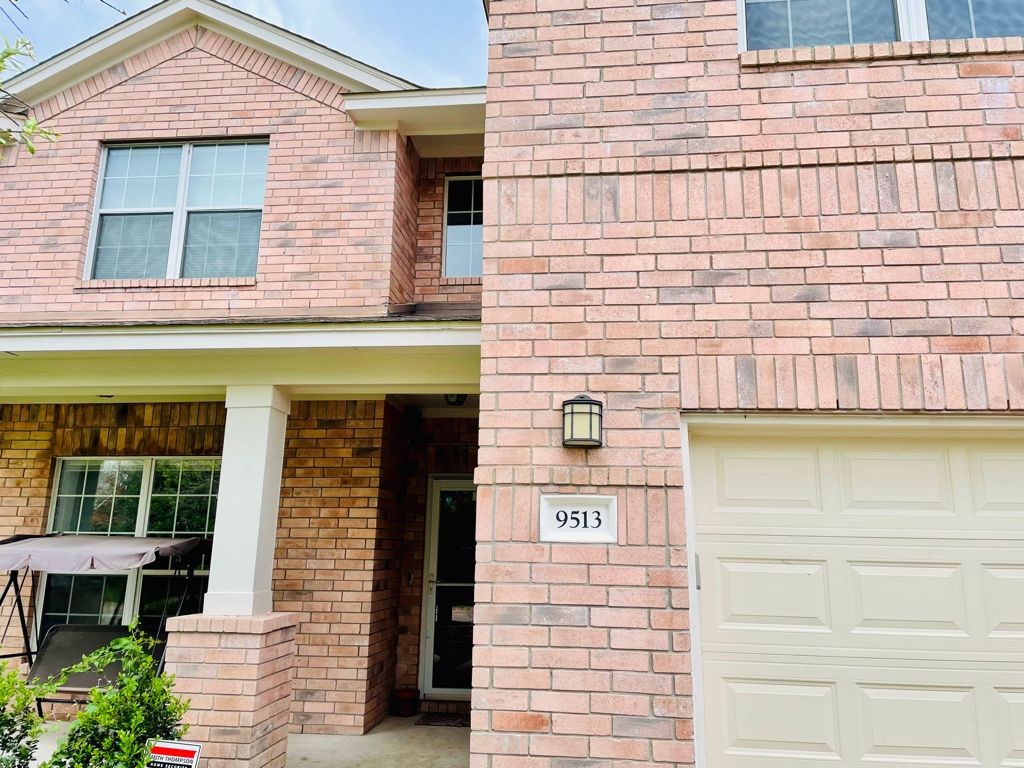 9513 Eagle Knoll Drive Austin, TX 78717 - Photo 1 of 1 a front view of a building with a window