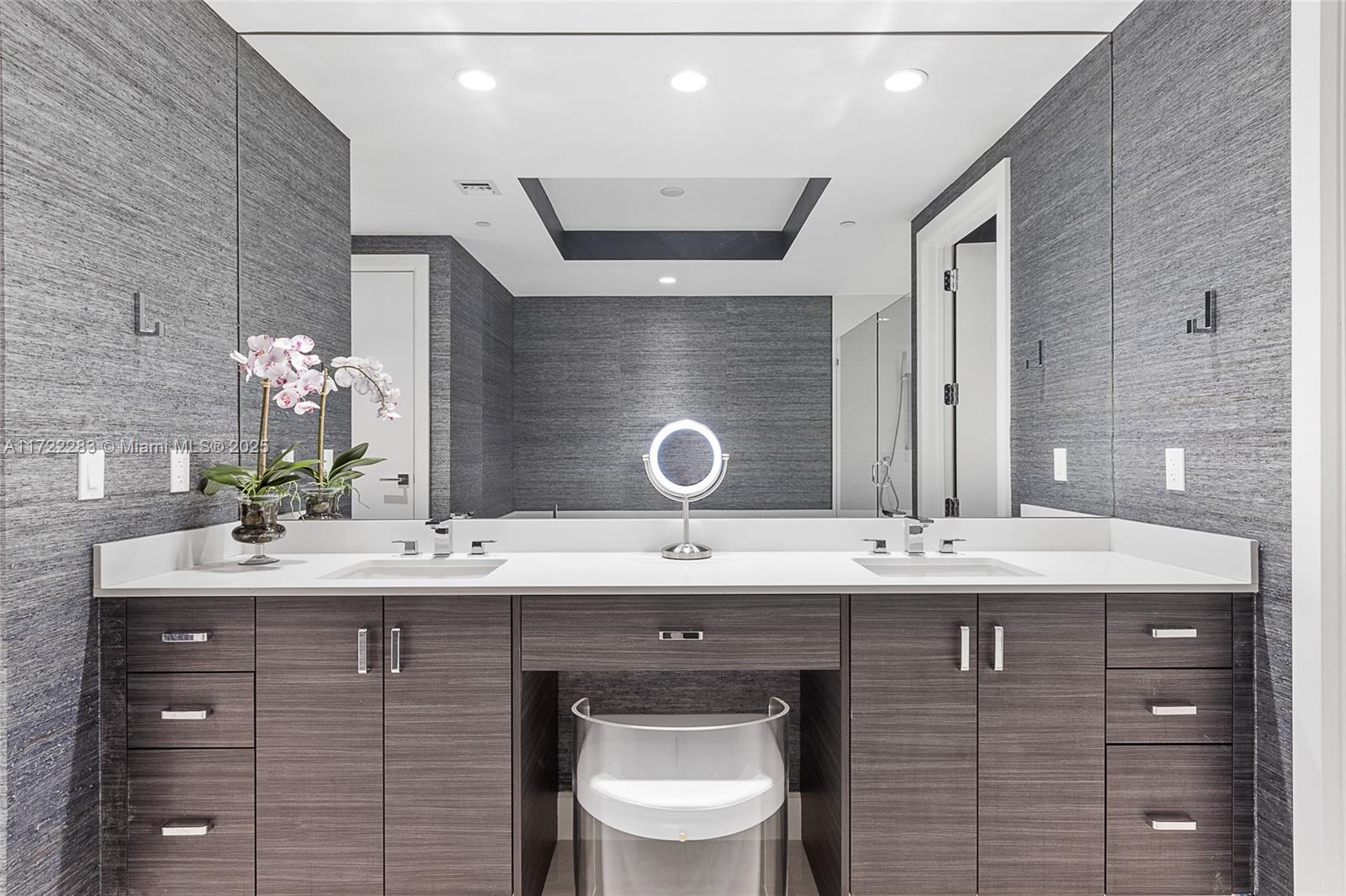 2720 Donald Ross Road, Unit 206 Palm Beach Gardens, FL 33410 - Photo 13 of 40 a bathroom with a double vanity sink and a mirror