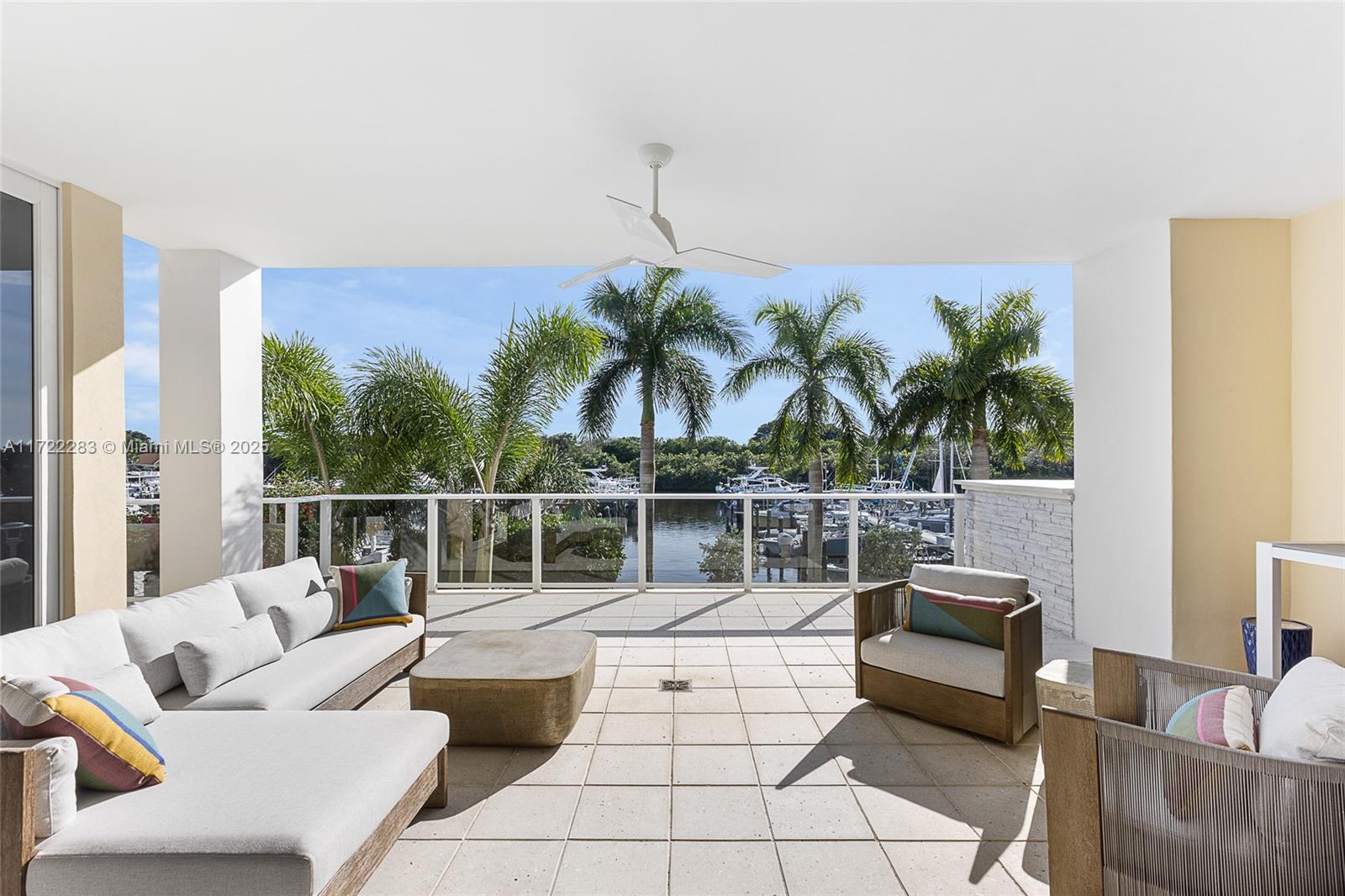 2720 Donald Ross Road, Unit 206 Palm Beach Gardens, FL 33410 - Photo 19 of 40 a living room with furniture and a potted plant