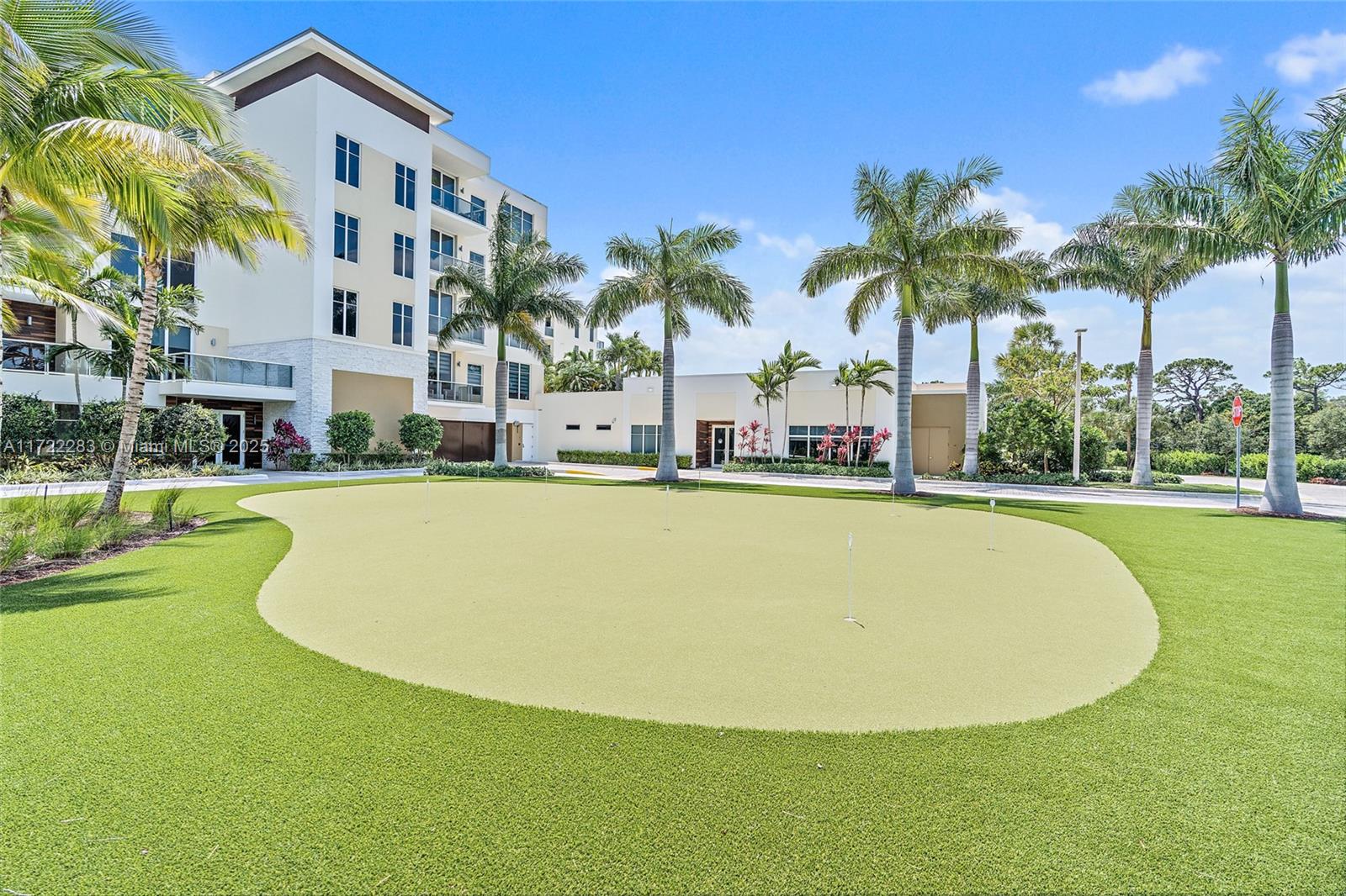 2720 Donald Ross Road, Unit 206 Palm Beach Gardens, FL 33410 - Photo 35 of 40 a view of outdoor space yard and swimming pool
