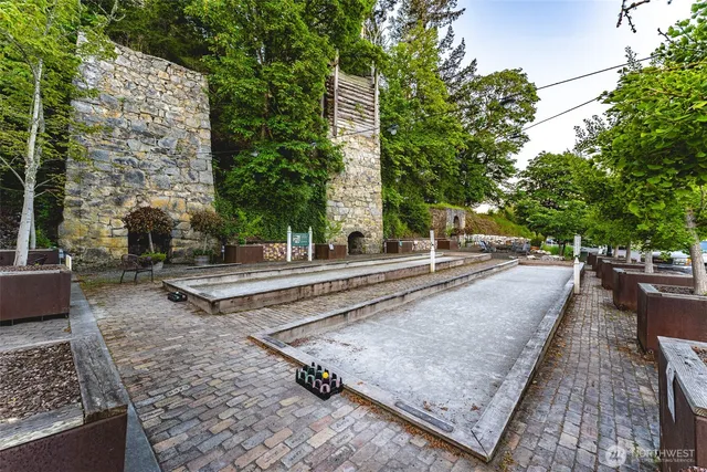 a view of a patio with a table and chairs