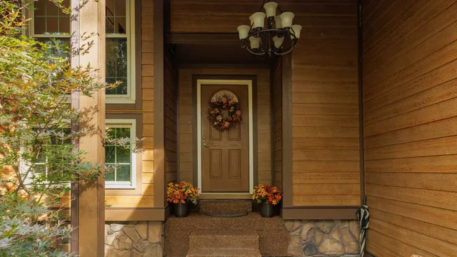 a view of entryway with hallway and wooden floor