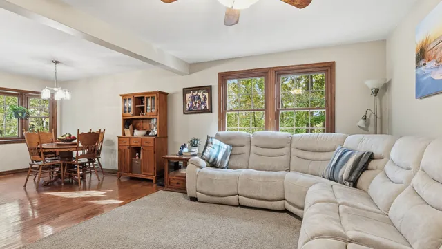 a kitchen with a stove a sink and cabinets