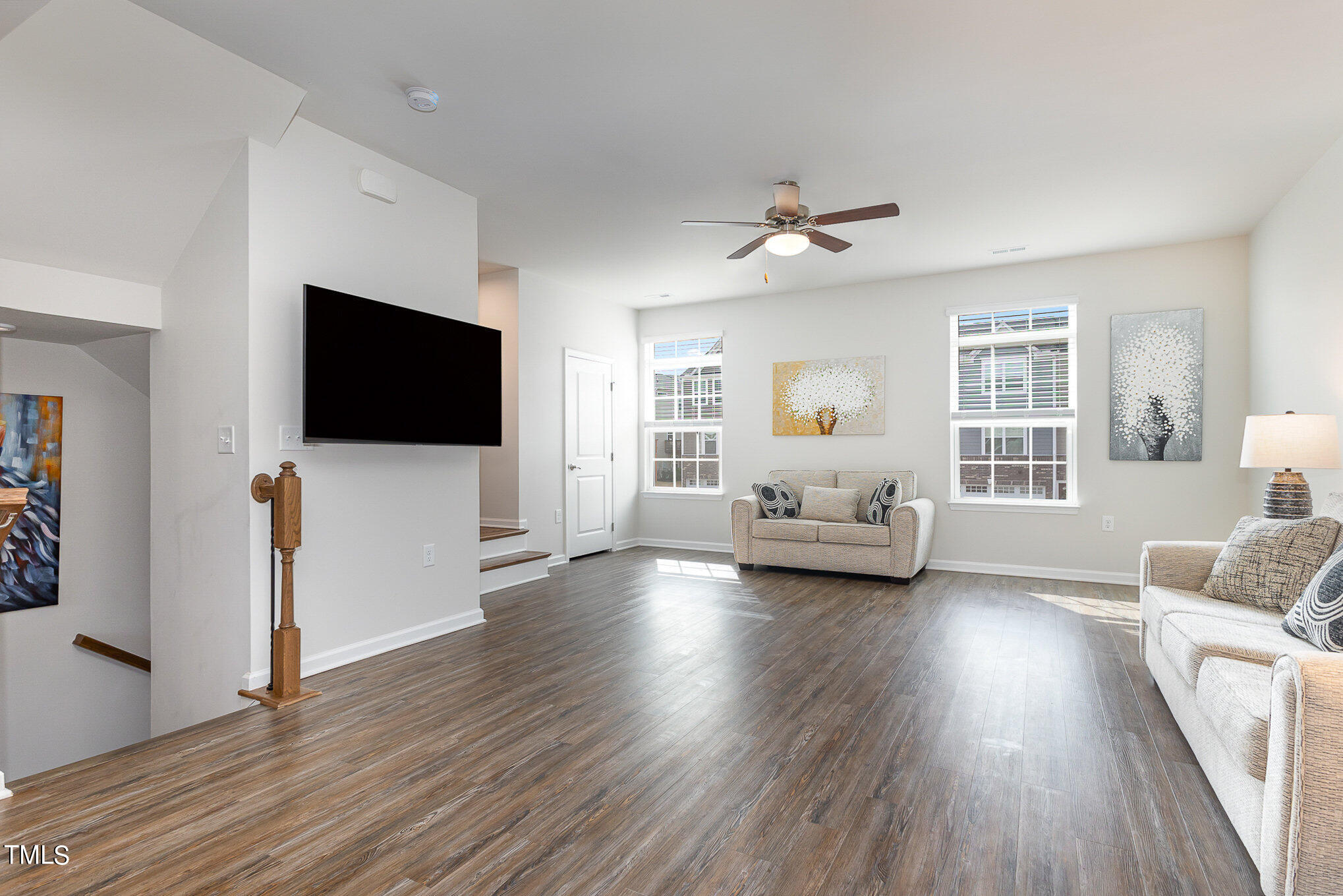4845 Randall Road Durham, NC 27707 - Photo 3 of 17 a living room with furniture and a flat screen tv