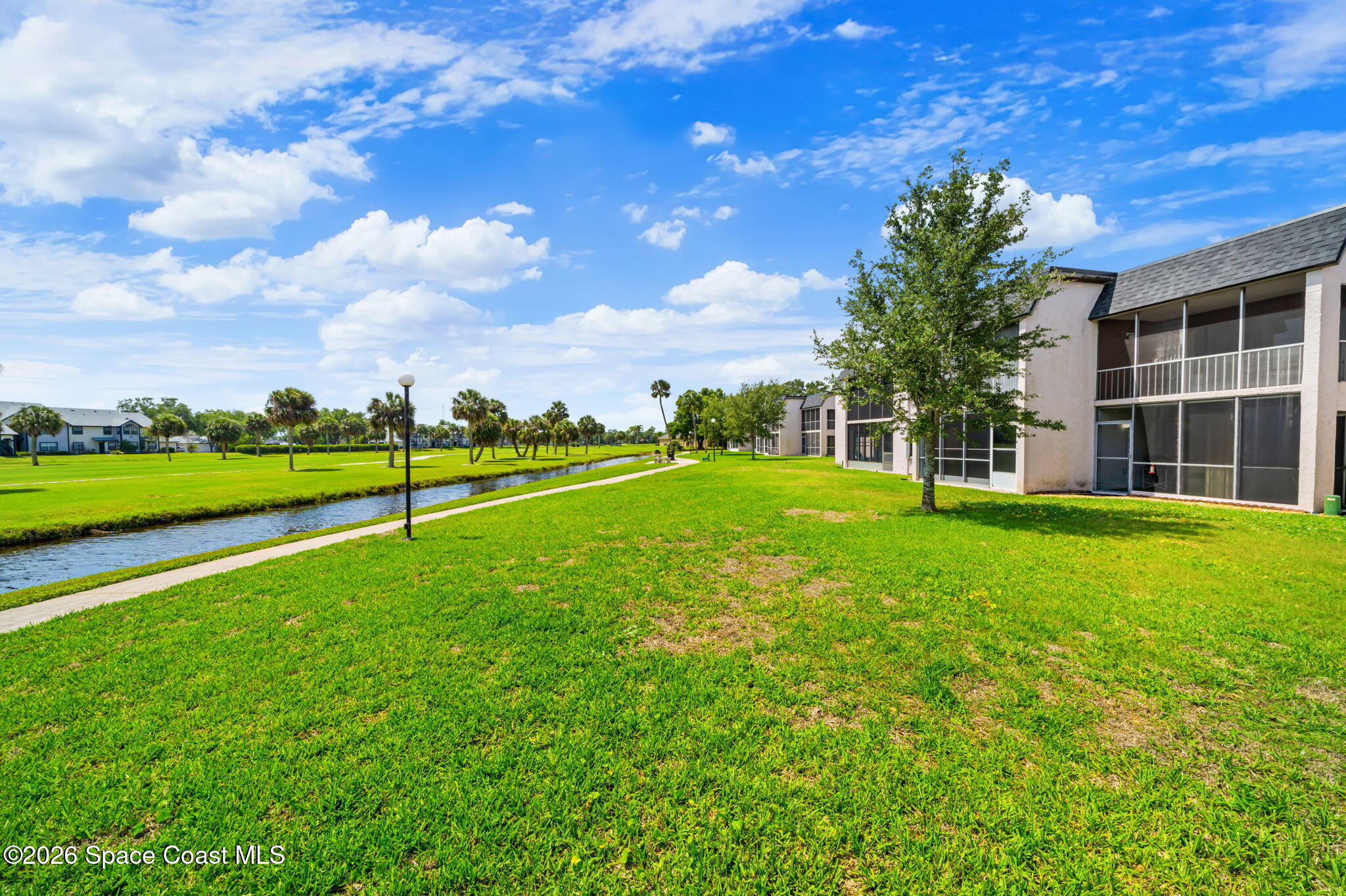 2727 North Wickham Road, Unit 1035 Melbourne, FL 32935 - Photo 24 of 29 Rear 4