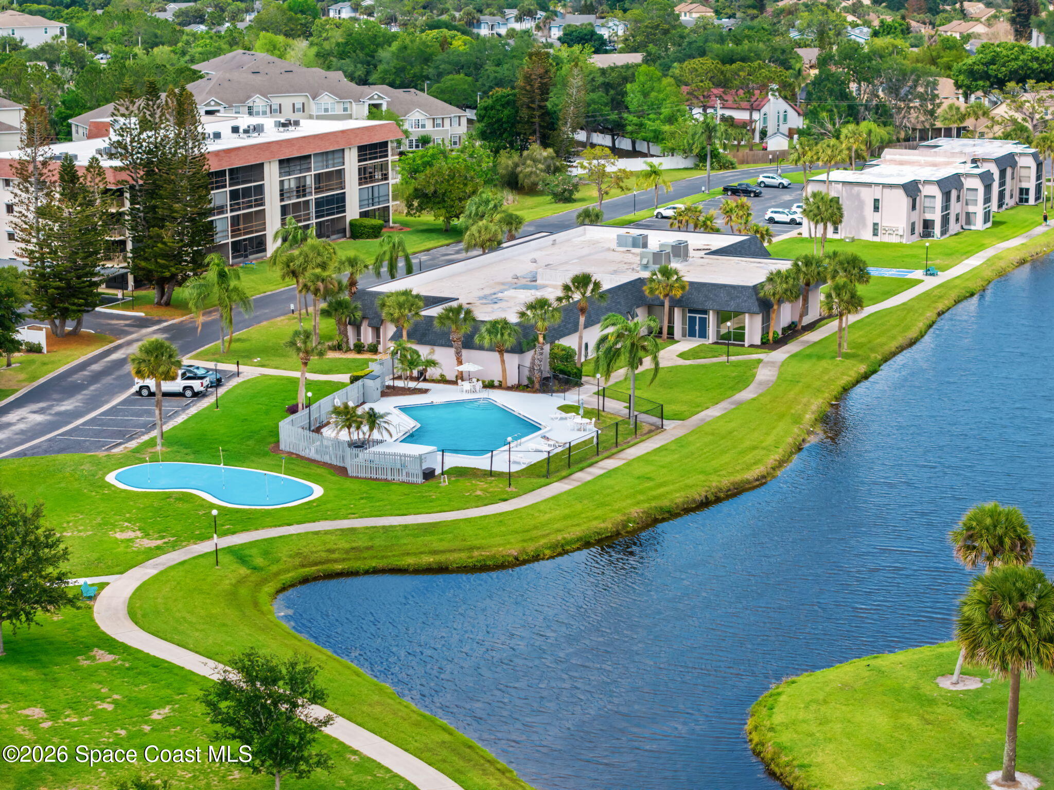 2727 North Wickham Road, Unit 1035 Melbourne, FL 32935 - Photo 26 of 29 Pool & Clubhouse