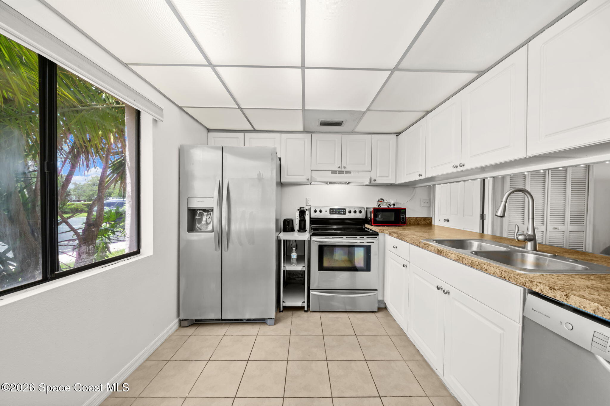 2727 North Wickham Road, Unit 1035 Melbourne, FL 32935 - Photo 5 of 29 Kitchen 2