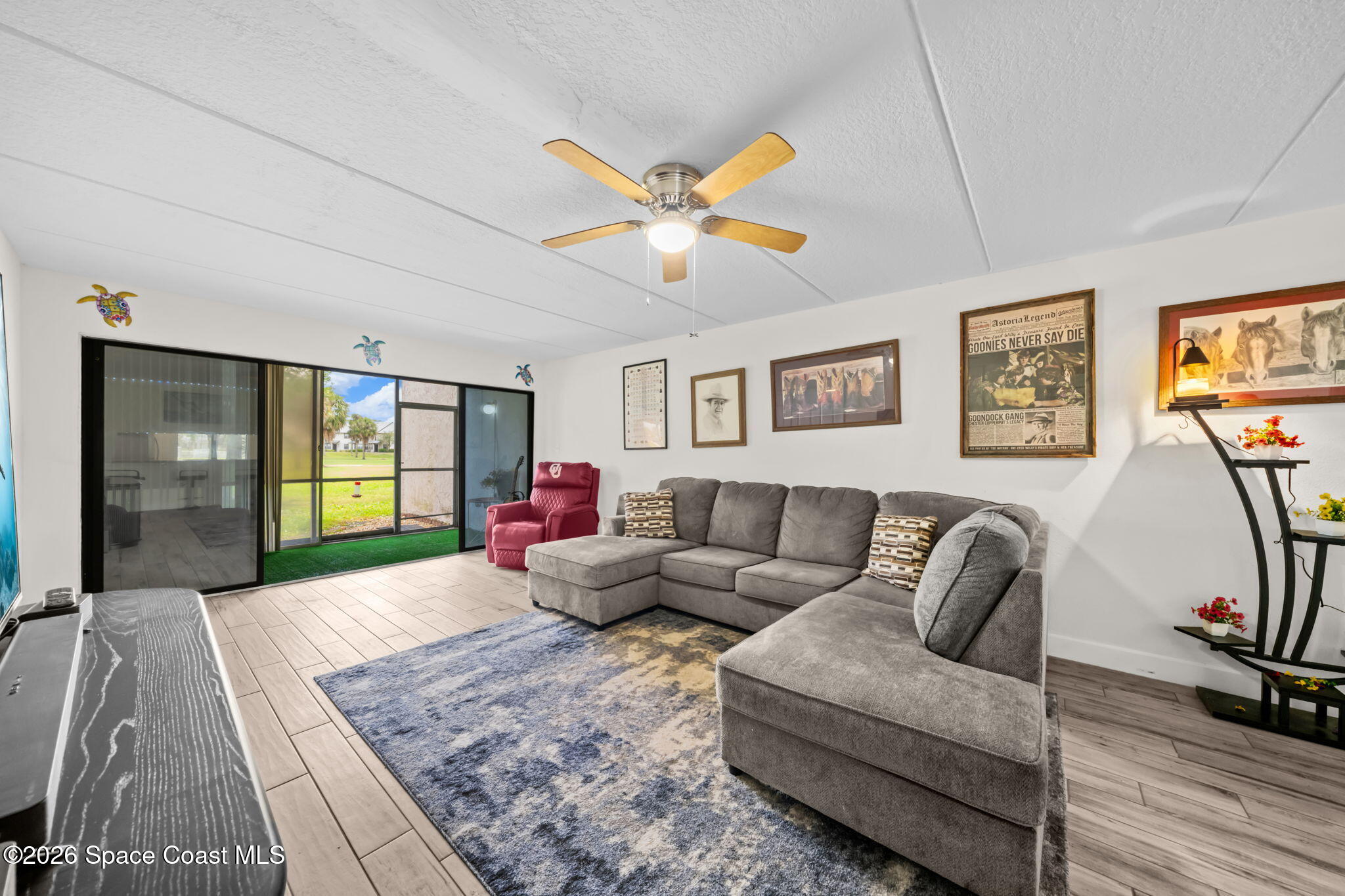 2727 North Wickham Road, Unit 1035 Melbourne, FL 32935 - Photo 6 of 29 Living Room 1
