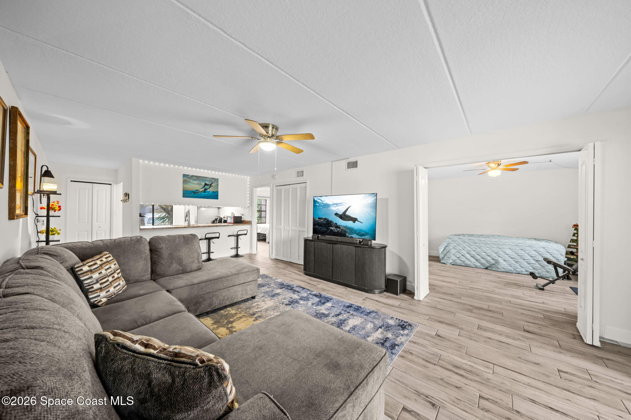 2727 North Wickham Road, Unit 1035 Melbourne, FL 32935 - Photo 7 of 29 Living Room 2