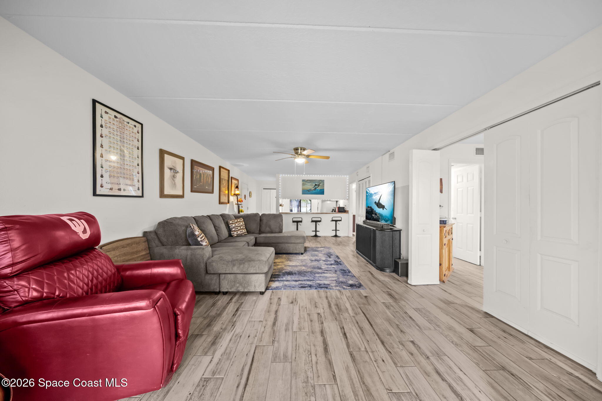 2727 North Wickham Road, Unit 1035 Melbourne, FL 32935 - Photo 8 of 29 Living Room 3