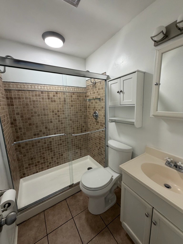 4924 Bayside Drive Riverside, OH 45431 - Photo 21 of 21 This functional bathroom features a tiled shower and practical vanity, perfect for daily routines.