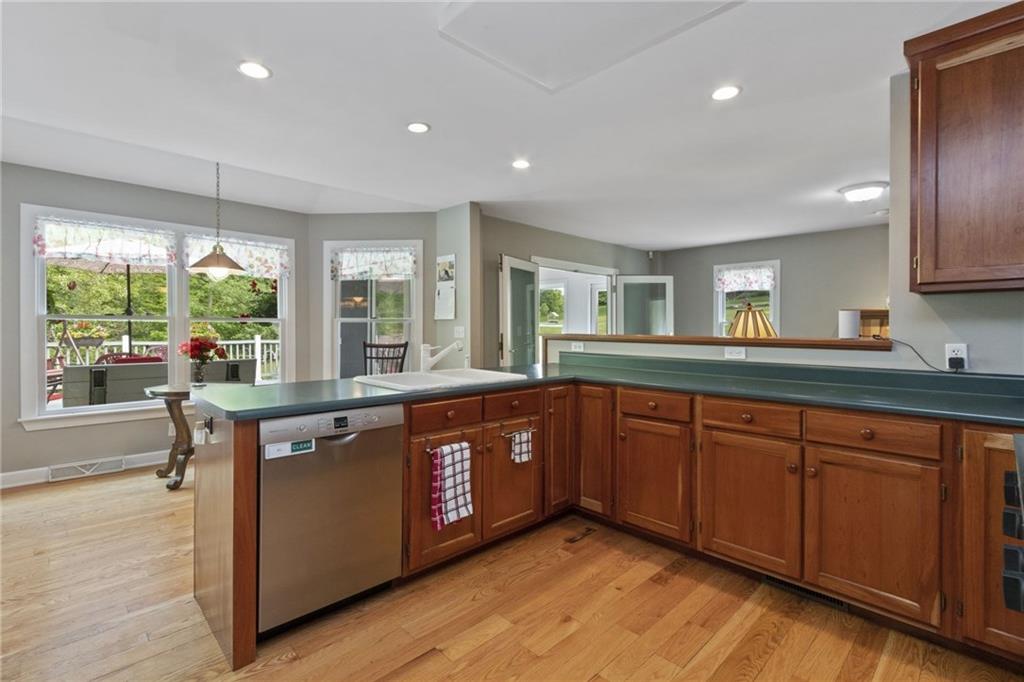 4661 Old Mercer Road Volant, PA 16156 - Photo 10 of 25 Open Area viewing breakfast nook, rear deck and family room